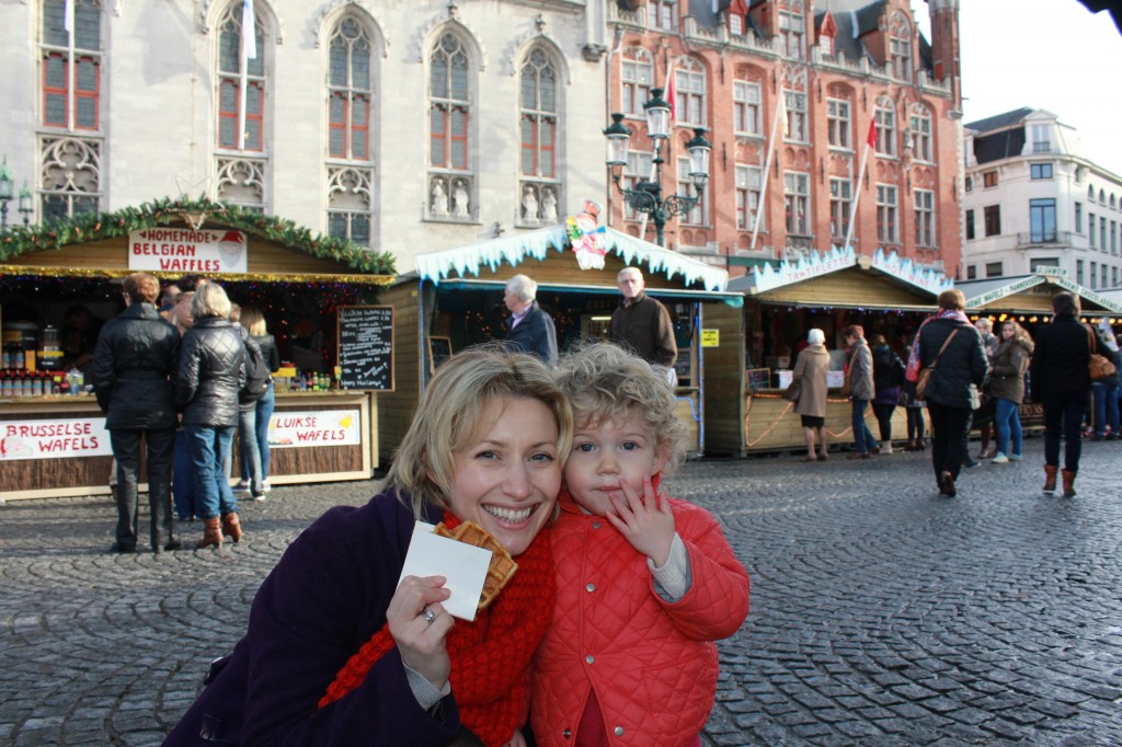 Eating waffles in Bruges