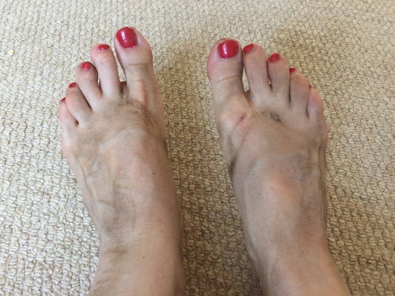 Very dirty feet after strawberry picking