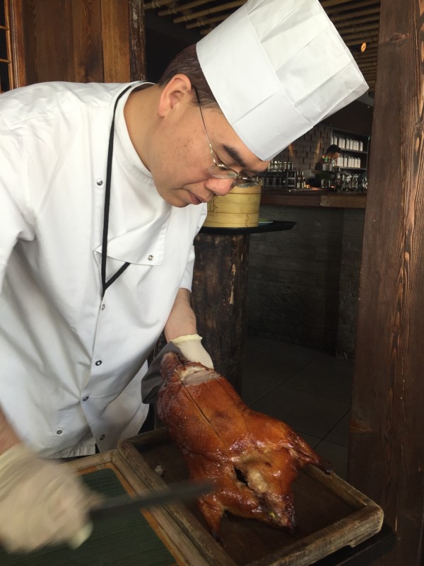 Carving peking duck at Hutong