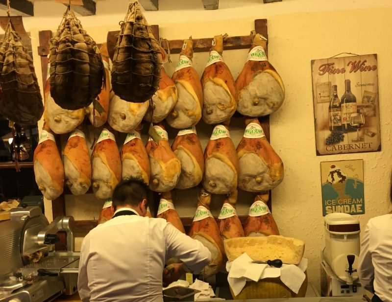 Proscuitto di Parma, Parma ham, hangs in a shop in Parma Emilia-Romagna, Italy