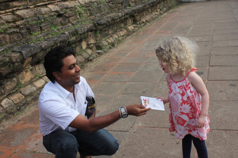 Our guide Dinesh with Mrs T at the Temple of the Tooth, Sri Lanka