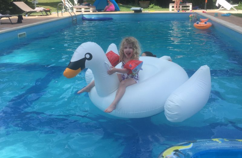 Italy: Mrs T on swan inflatable