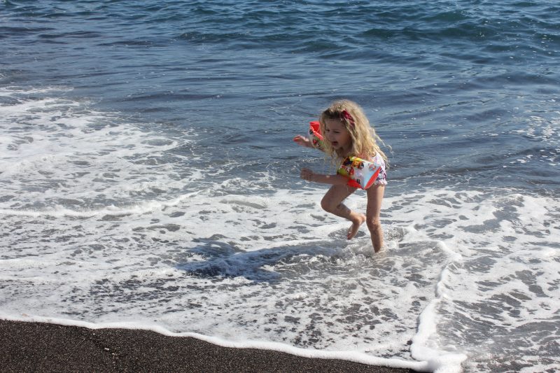 Perissa beach in Santorini, family holiday