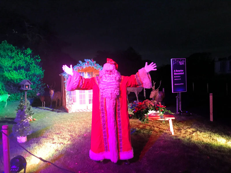 Father Christmas greets children at Christmas at Kew